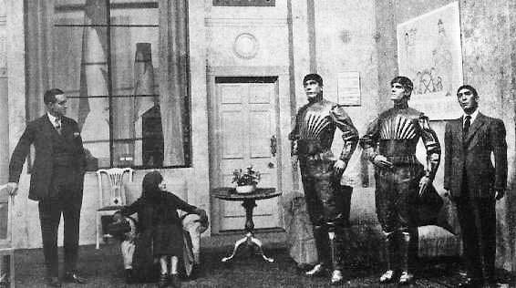 Scene from the Czech play R.U.R. by Karel Capek, where the term Robot (robota) was first used.